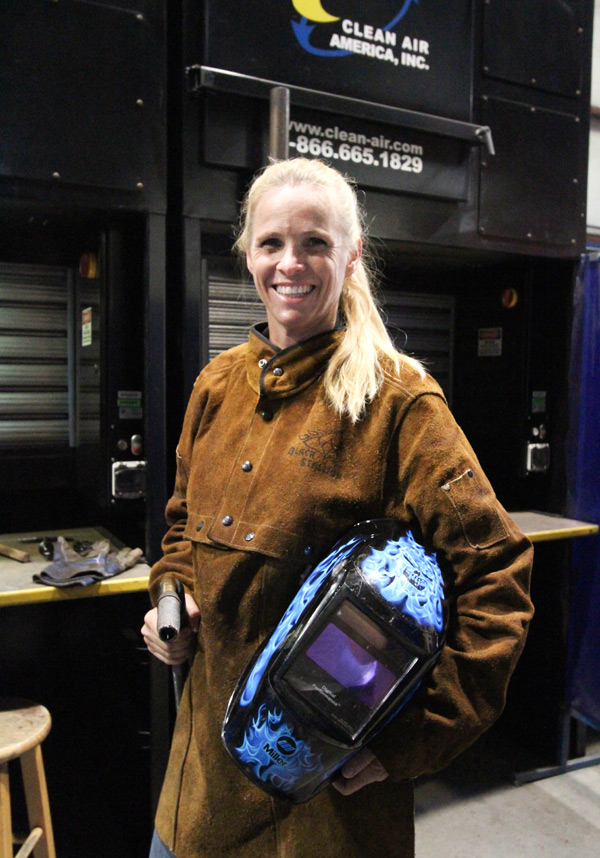 Michelle Warren, Welding Student in the welding lab 